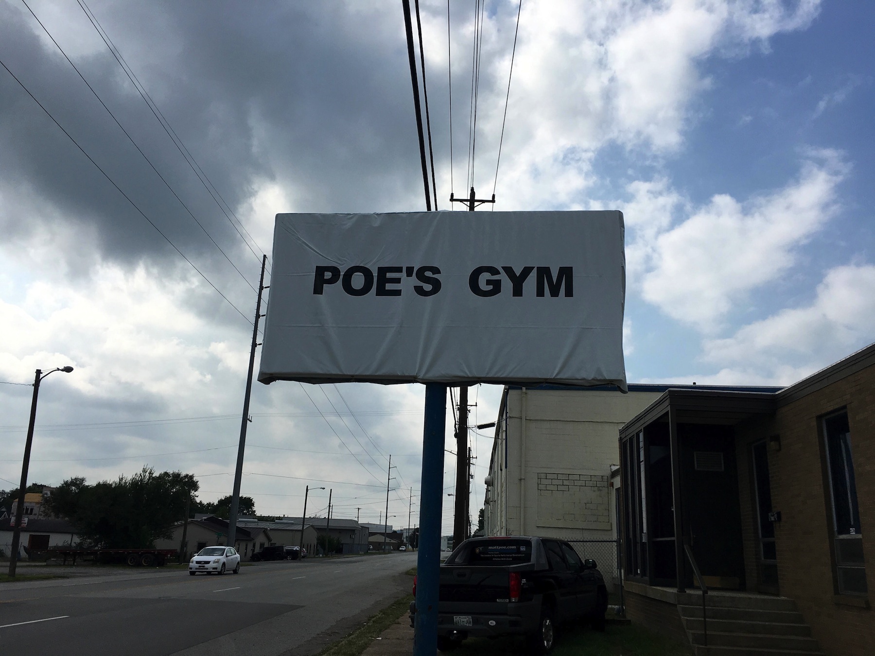 Poes Gym Sign